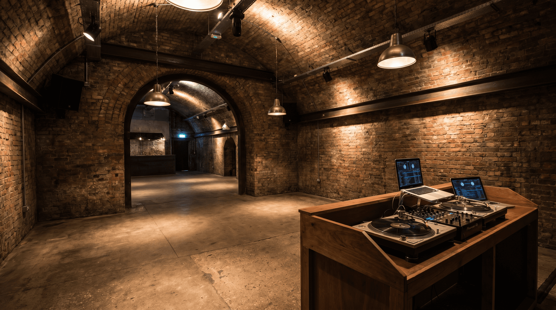 Empty nightclub interior with distinctive industrial architecture and dual room layout