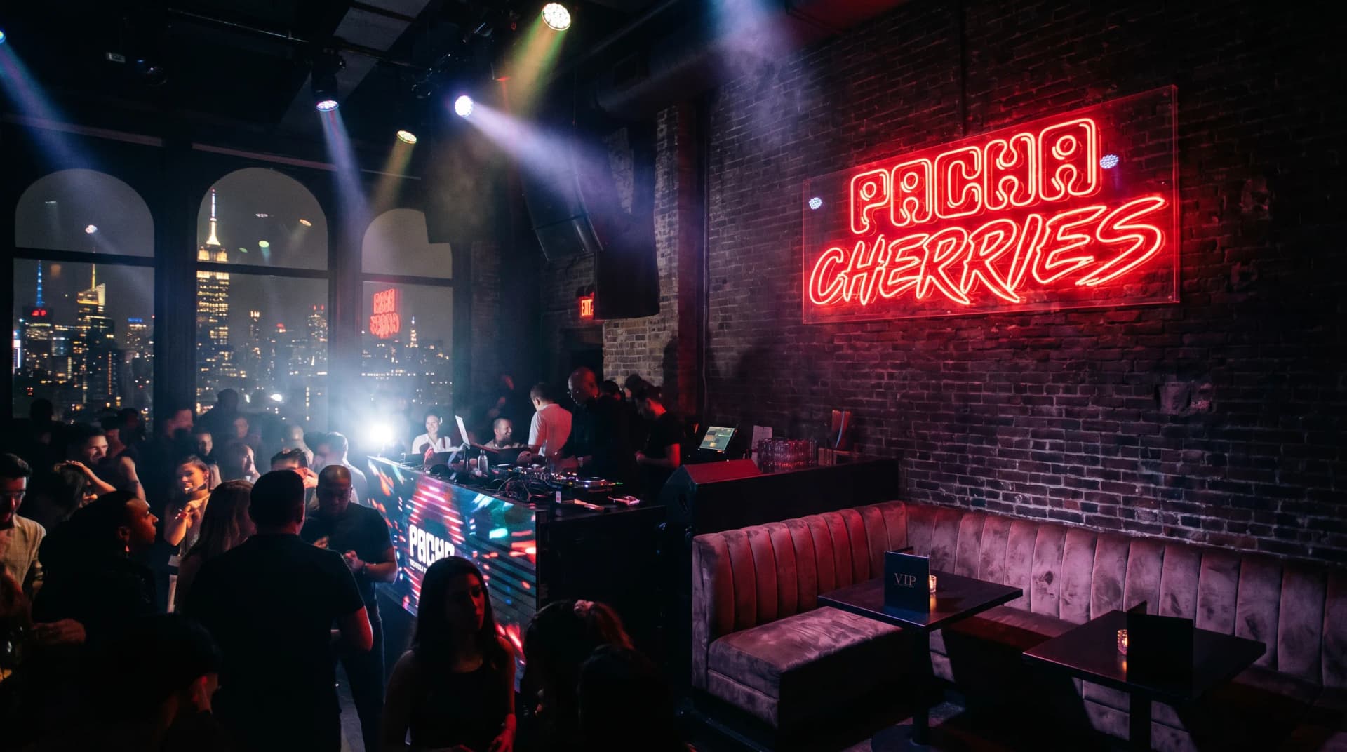 Pacha club logo and branding with New York City nightclub interior