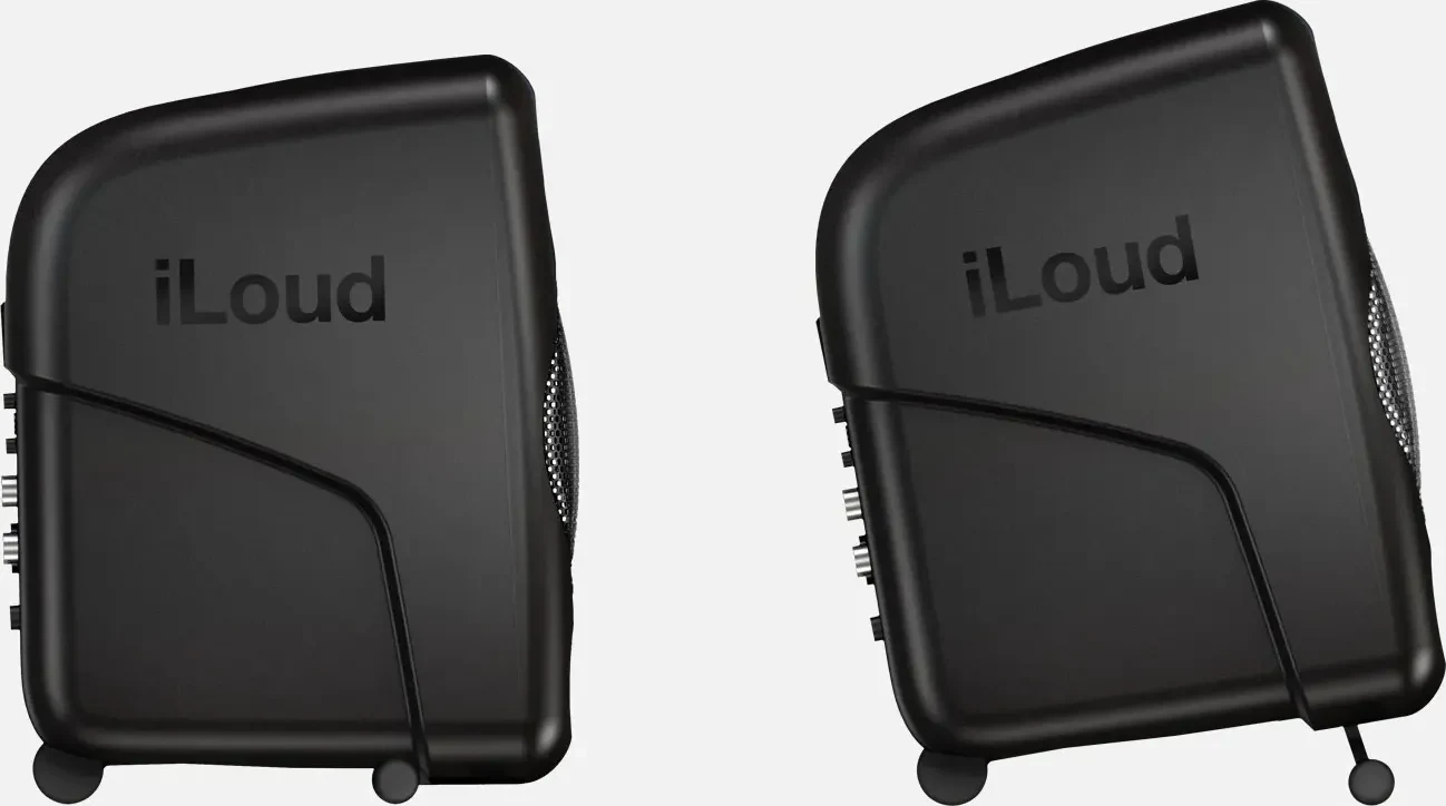 Two iLoud Micro Monitors from the side, one flat and one tilted up on its stand