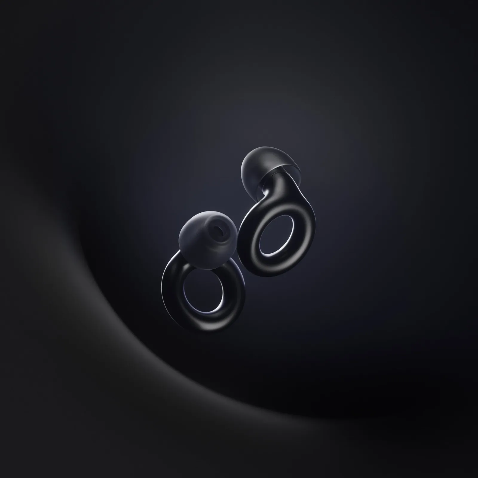 A pair of black Loop Experience 2 earplugs