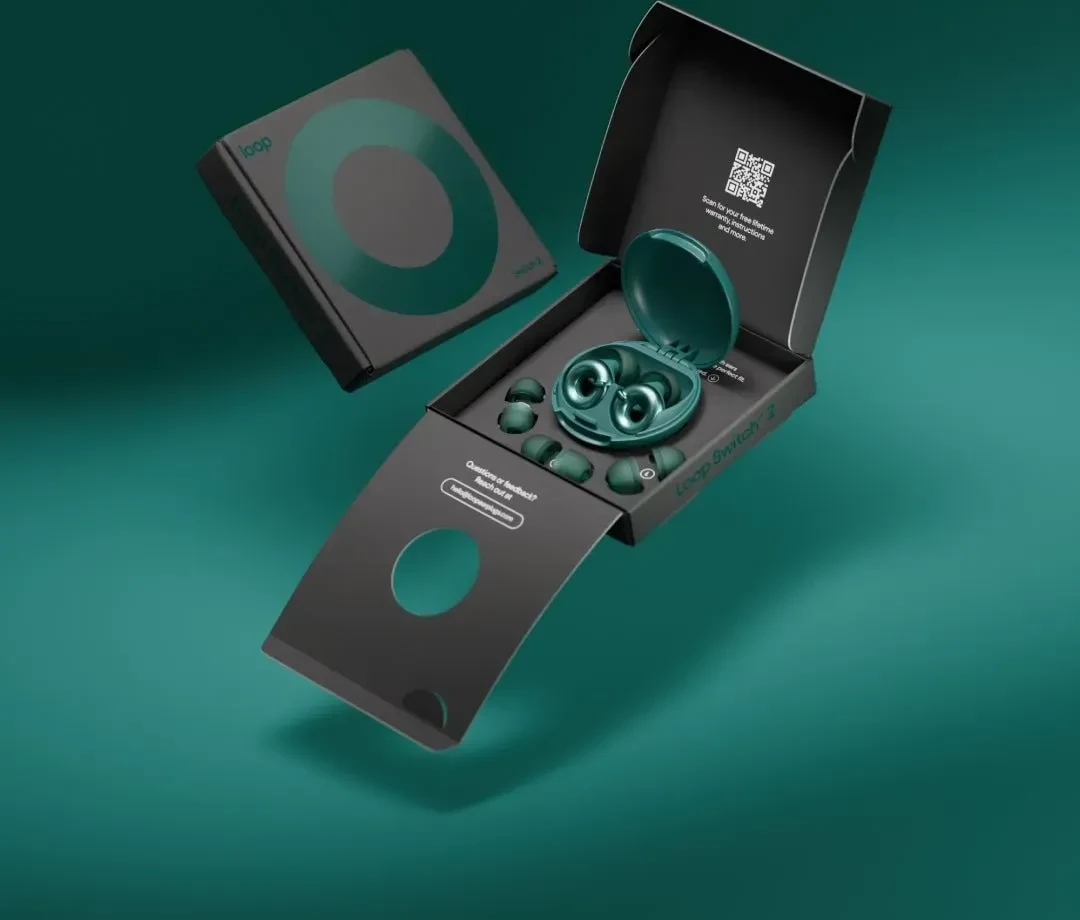 Loop Switch 2 box opened to show the carry case and spare ear tips