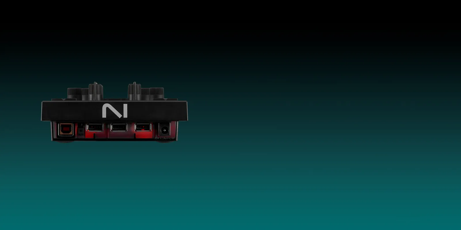 Rear panel of the Traktor X1 MK3 with its USB hub ports and power socket