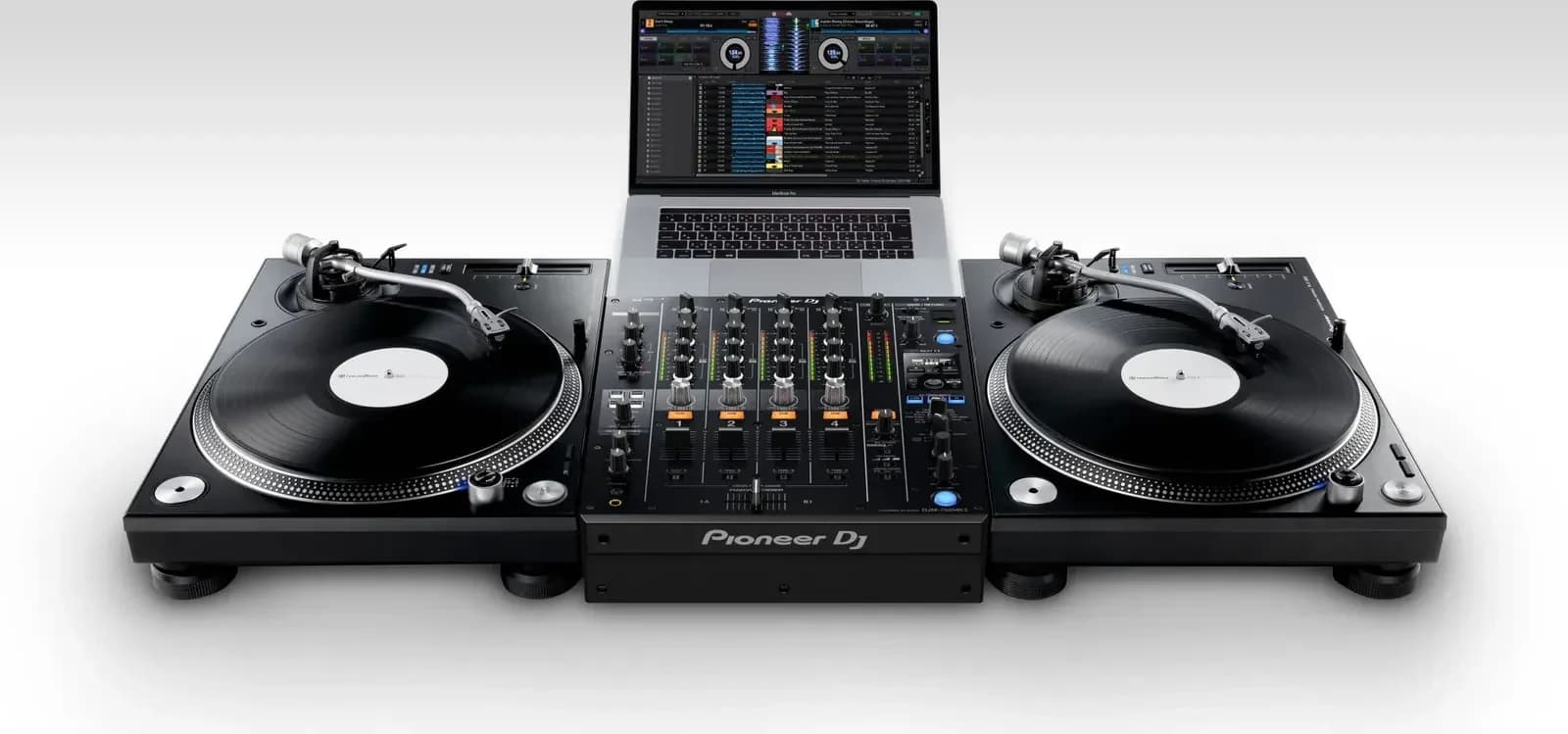 Pioneer DJ DJM-750MK2 between two PLX-1000 turntables, with a laptop