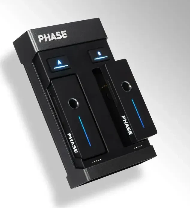 Phase Essential receiver with its two remotes docked