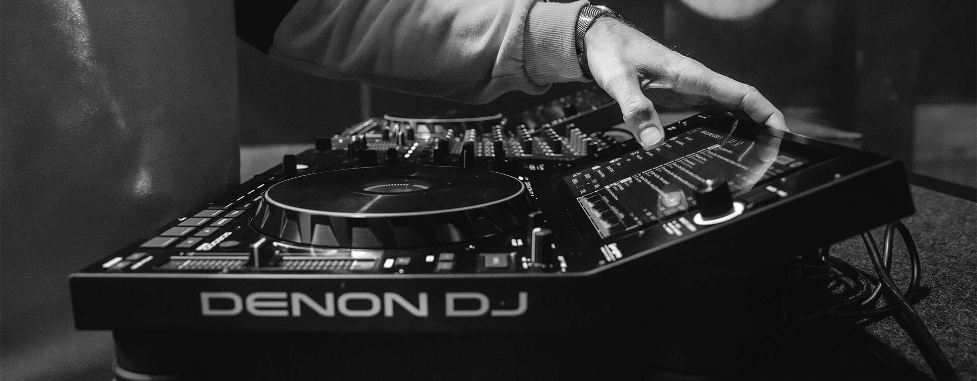 Person playing the Denon DJ SC6000